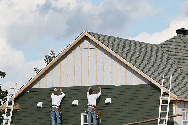 Professional Siding technician working in Lothian, MD
